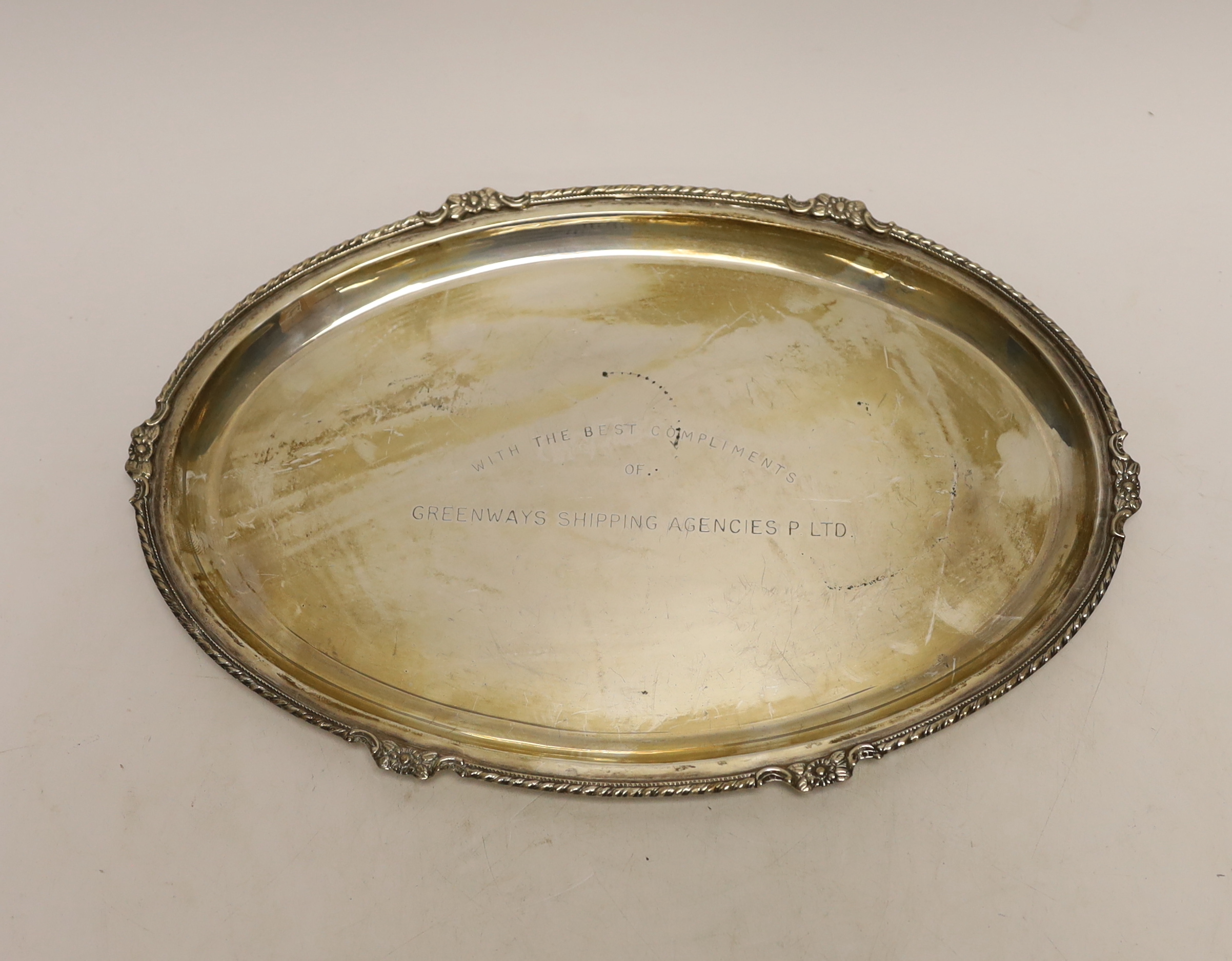 An Indian engraved white metal oval dish, 30.7cm, 10.9oz.
